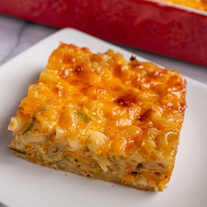 Creamy baked-style crockpot mac and cheese in a serving dish
