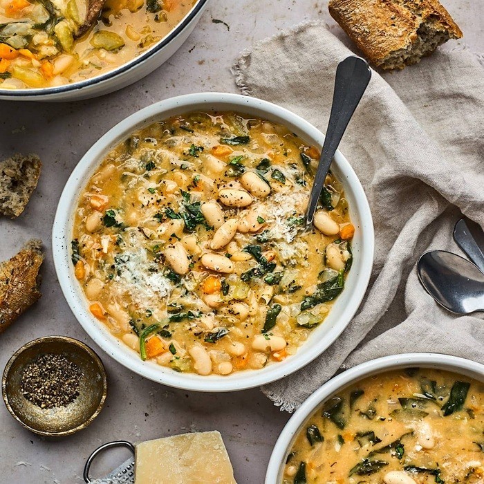 Rustic crockpot ham and bean soup in a bowl